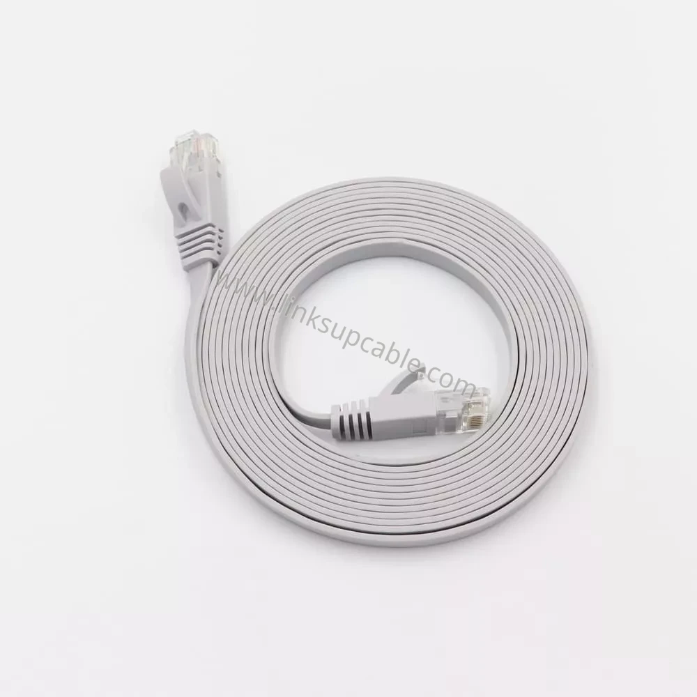 Cat6 Flat Ethernet Patch Cable — 1Gbps 550MHz UTP RJ45 Cord, Custom Color & Length 3 Grey Cat6 flat Ethernet patch cable coiled with snagless RJ45 connectors for office network cabling