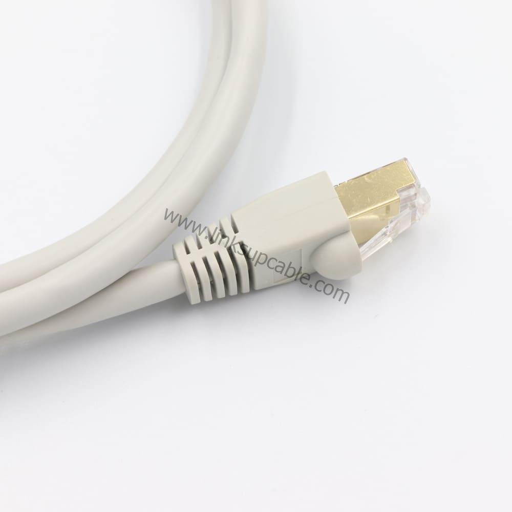 Cat6 Shielded Ethernet Cable Gigabit 250MHz Heavy-Duty Round STP/FTP High-Speed Patch Cord 3 Cat6 Shielded Heavy-Duty Round Cable Connected to Network Switch and Server Rack