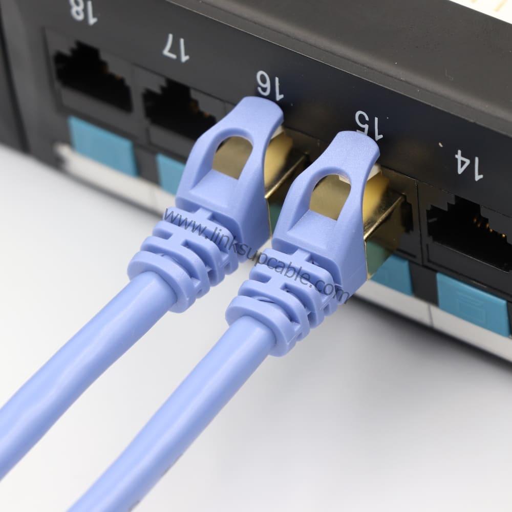 Cat7 Ethernet Cable 10Gbps 600MHz Heavy-Duty Shielded (S/FTP) Round High-Speed Patch Cord 3 Cat7 Heavy-Duty Round Patch Cable Connected to Network Switch and Server Rack